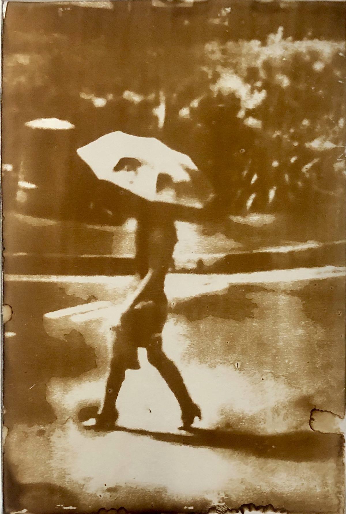 Przemek Zajfert, "The Woman with an Umbrella" – heliograph from Google Street View Frame, Singapore, January 2009. Heliography Project 1827–2027 Przemek Zajfert, "The Woman with an Umbrella" – heliograph from Google Street View Frame, Singapore, January 2009. Heliography Project 1827–2027